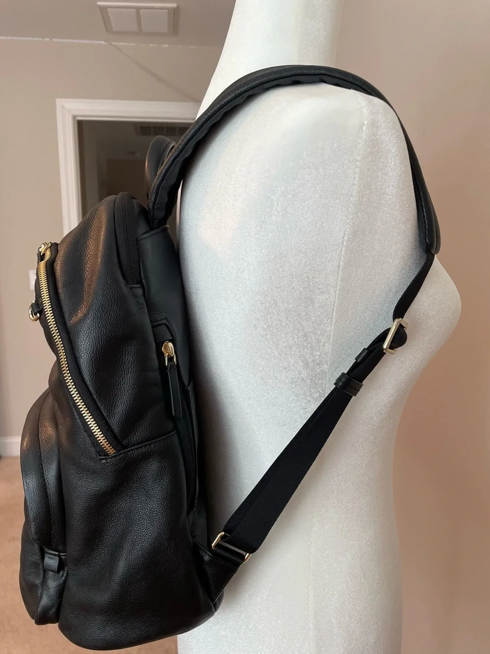 Tumi Black Leather Backpack with Goldtone Hardware
